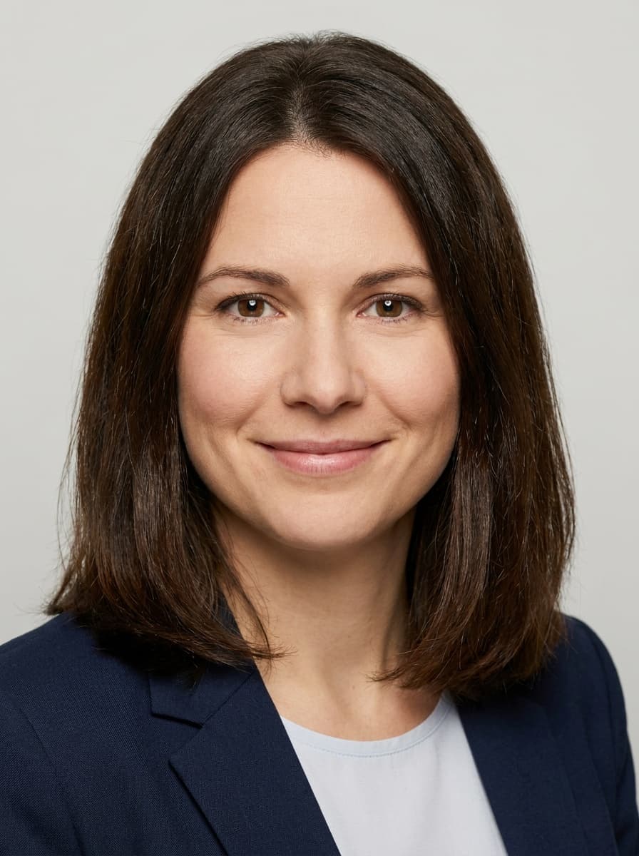 Sample synthetic staff portrait (not a real person), shown in a Photon photo check